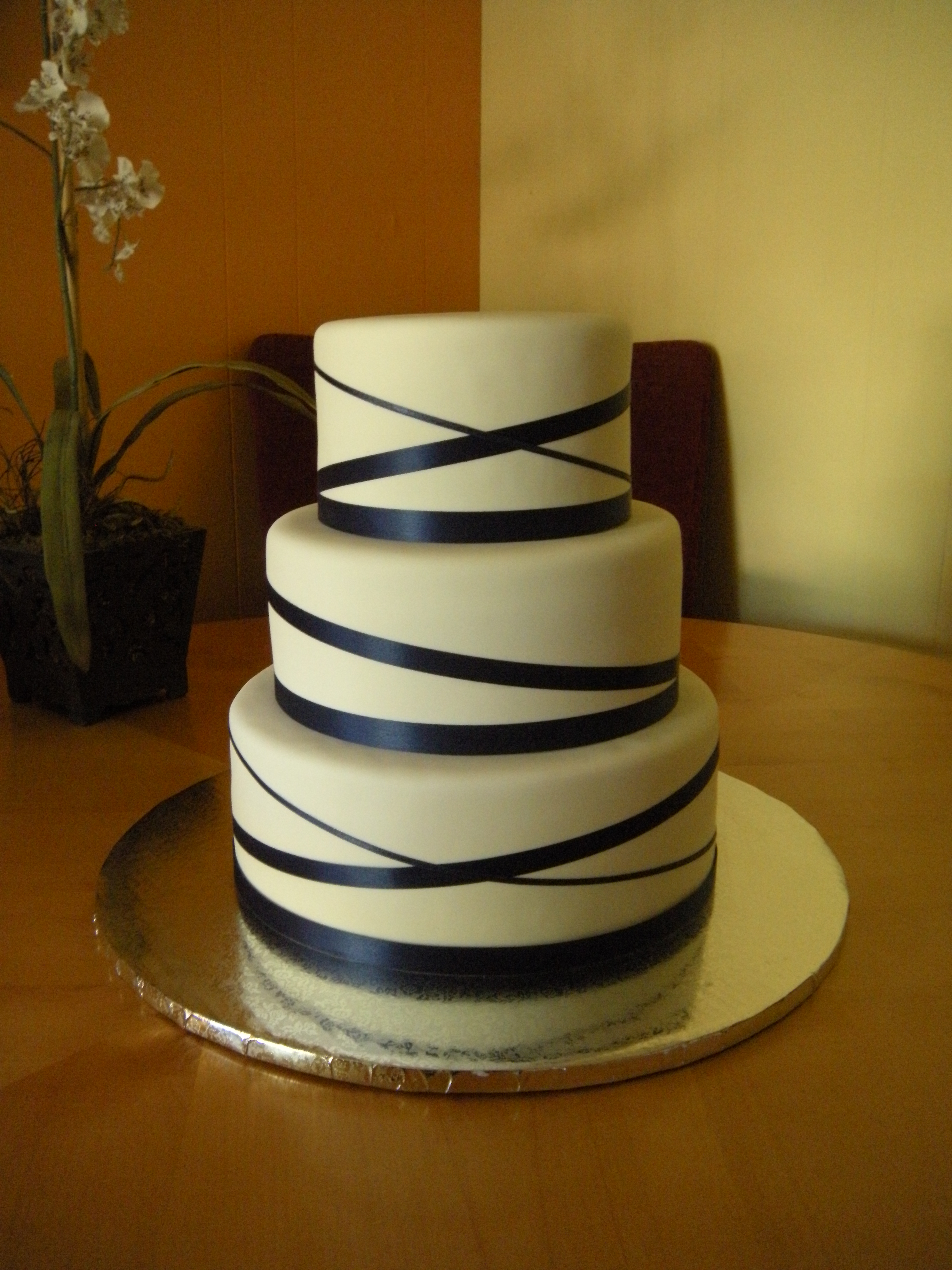  wedding cake with ribbon  Main Made Custom Cakes 